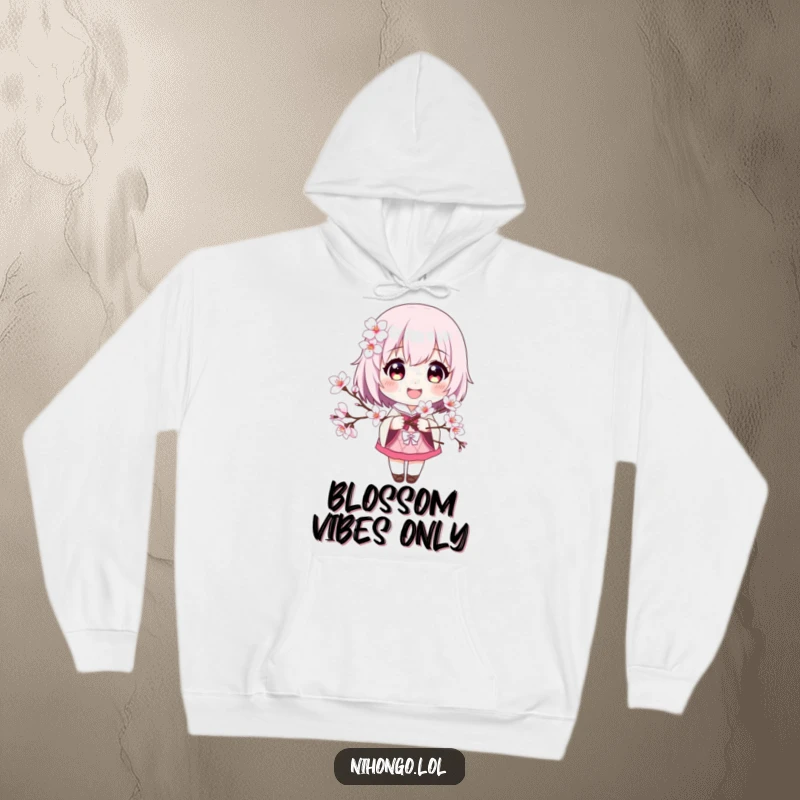 Funny hoodie with a smiling character holding a vibrant cherry blossom branch, offering warmth and a touch of springtime magic.