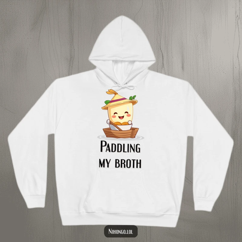 Funny Hoodie: A smiling ramen bowl wearing a straw hat navigates a shoebox boat, a humorous and cozy design for noodle fans.