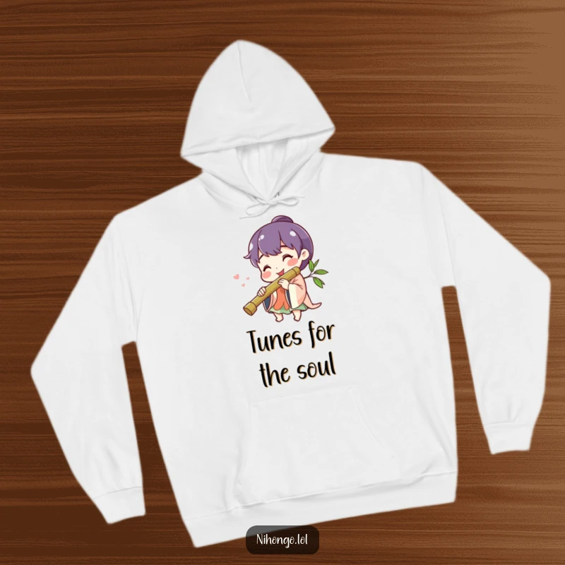 Funny cheerful character smiling, playing a bamboo flute, depicted on a warm, cozy hoodie, embodying musical delight.