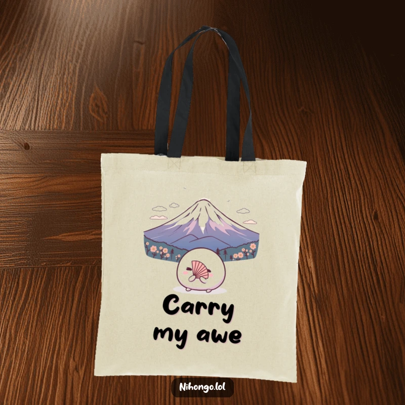 Funny tote bag with a shy mochi ball and a tiny fan bowing to Mount Fuji, practical and humorous.
